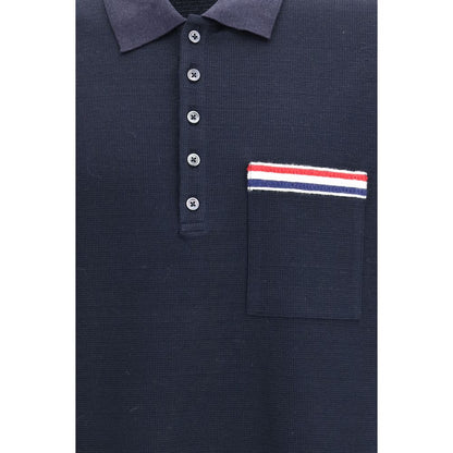 This Polo Shirt by Thom Browne for men in cotton linen & polyamide blue, signature & striped presents a flawless silhouette, showcasing flawless detailing and a refined for a truly flawless aesthetic.