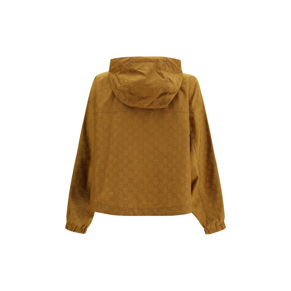 Hooded Windbreaker Jacket by Gucci for women in nylon beige & jacquard features an magnificent silhouette, showcasing the sophisticated hooded neckline and functional lightweight, pockets, hooded & windproof for a premium, magnificent look.