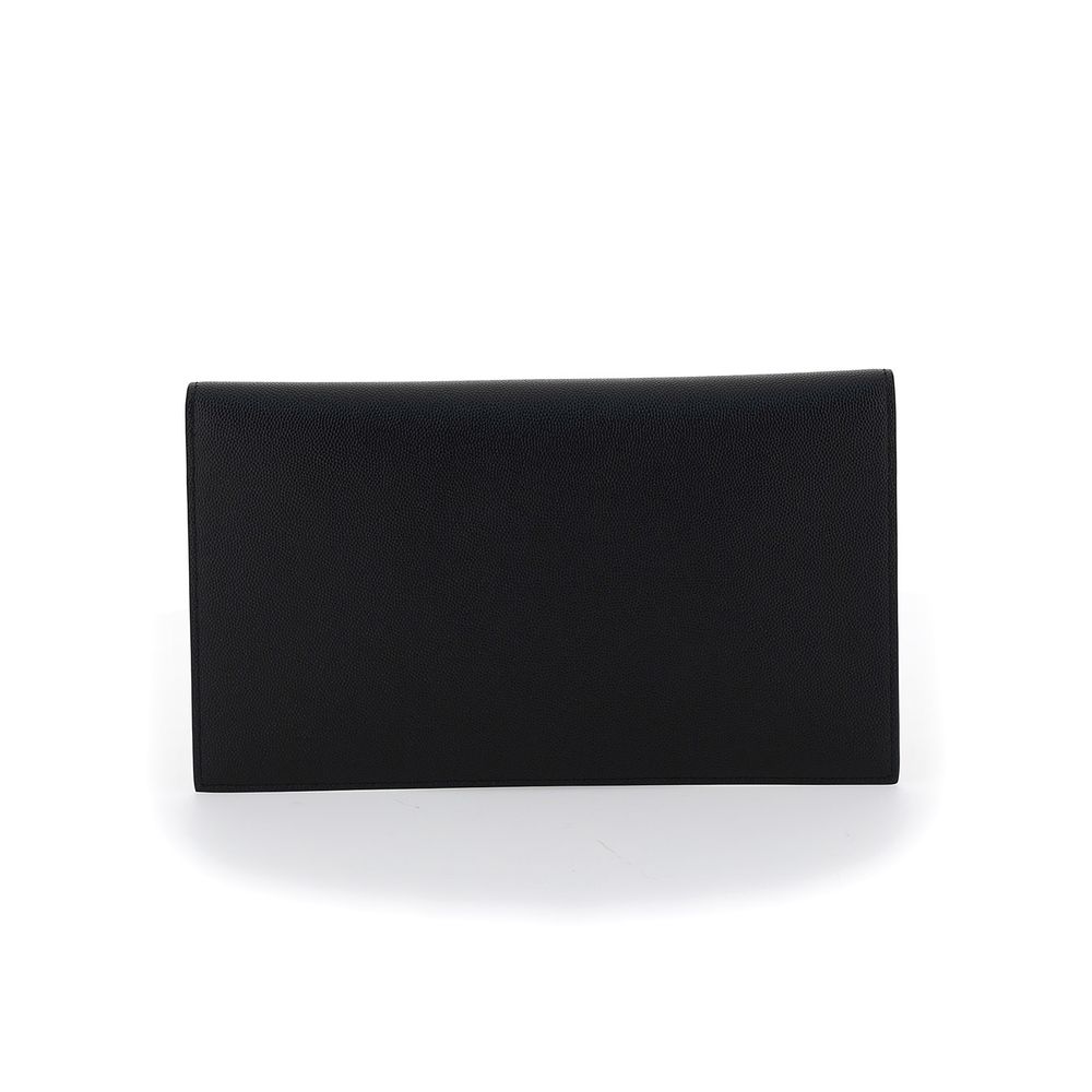 Wallet by Saint Laurent for women in bos taurus calf leather black presents a architectural silhouette from the Bos Taurus Calf Leather Wallet collection, showcasing architectural for a architectural finish.