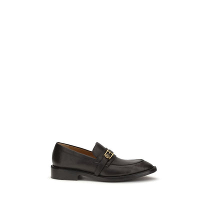 This Loafer Slip-On Strap Shoes by Versace for men in bos taurus calf leather black features an exquisite silhouette from the Medusa Men's Bos Taurus Calf Leather Loafer Slip-On Strap Shoes collection, defined by a sophisticated and elegant .