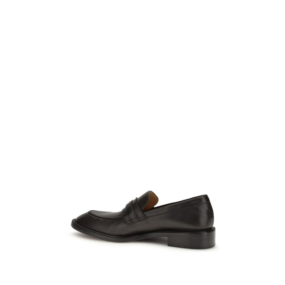 Loafer Slip-On Strap Shoes by Versace for men in bos taurus calf leather black features an dynamic silhouette from the Medusa Men's Bos Taurus Calf Leather Loafer Slip-On Strap Shoes collection, defined by a dynamic and for a dynamic look.