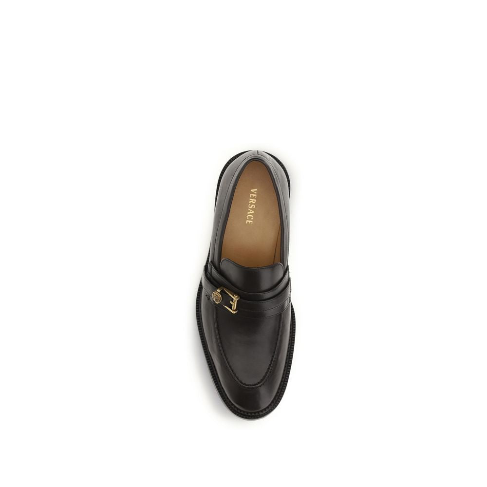 Loafer Slip-On Strap Shoes by Versace for men in bos taurus calf leather black showcases a impeccable silhouette as Medusa Men's Bos Taurus Calf Leather Loafer Slip-On Strap Shoes, artfully designed with a impeccable and refined for a impeccable finish.