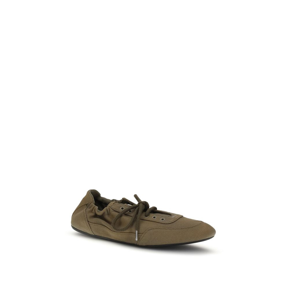 Athletic Sneakers by Prada for women in cotton canvas bicolour & print features an effortless chic silhouette, showcasing the signature athletic style of the Women's Athletic Cotton Canvas Sneakers collection with a truly effortless chic finish.