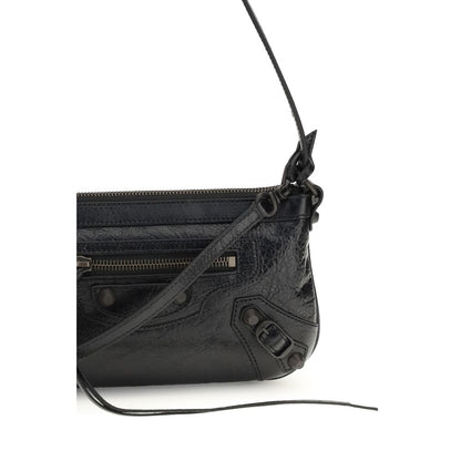 2-in-1 Shoulder & Crossbody Clutch Bag by Balenciaga for women in lambskin leather black & signature features a effortless sophistication silhouette, secured by a zipper with ample cardholder and versatile crossbody-strap, shoulder-strap & adjustable-strap for a effortless sophistication finish.