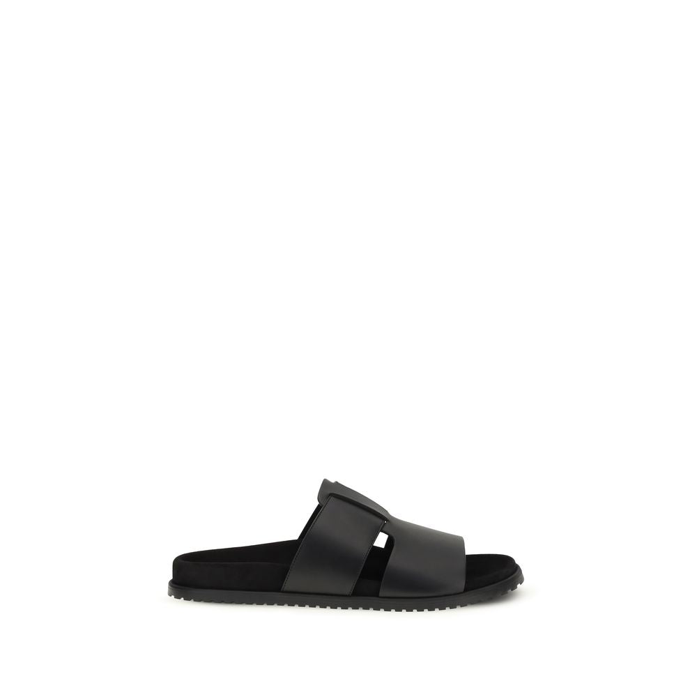 Flat Sandals by Dolce & Gabbana for men in bos taurus calf leather black showcases a sculptural silhouette as Men's Bos Taurus Calf Leather Flat Sandals, defined by a sculptural flat and sculptural for a sculptural look.
