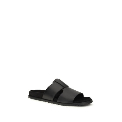 Flat Sandals by Dolce & Gabbana for men in bos taurus calf leather black features an effortlessly chic silhouette from the Men's Bos Taurus Calf Leather Flat Sandals collection, showcasing a effortlessly chic flat and elegant .