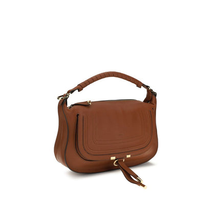 Compact 2-in-1 Shoulder & Crossbody Flap Satchel Bag by Chloé for women in bos taurus calf leather brown & signature features a effortless sophistication silhouette, secured by a flap & zipper with ample external-pockets and versatile crossbody-strap, shoulder-strap & adjustable-strap for a effortless sophistication finish.