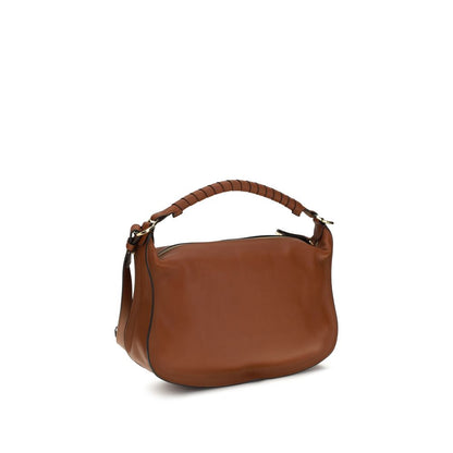 Compact 2-in-1 Shoulder & Crossbody Flap Satchel Bag by Chloé for women in bos taurus calf leather brown & signature features a effortless chic silhouette with a secure flap & zipper, ample external-pockets, and versatile crossbody-strap, shoulder-strap & adjustable-strap for a effortless chic finish.