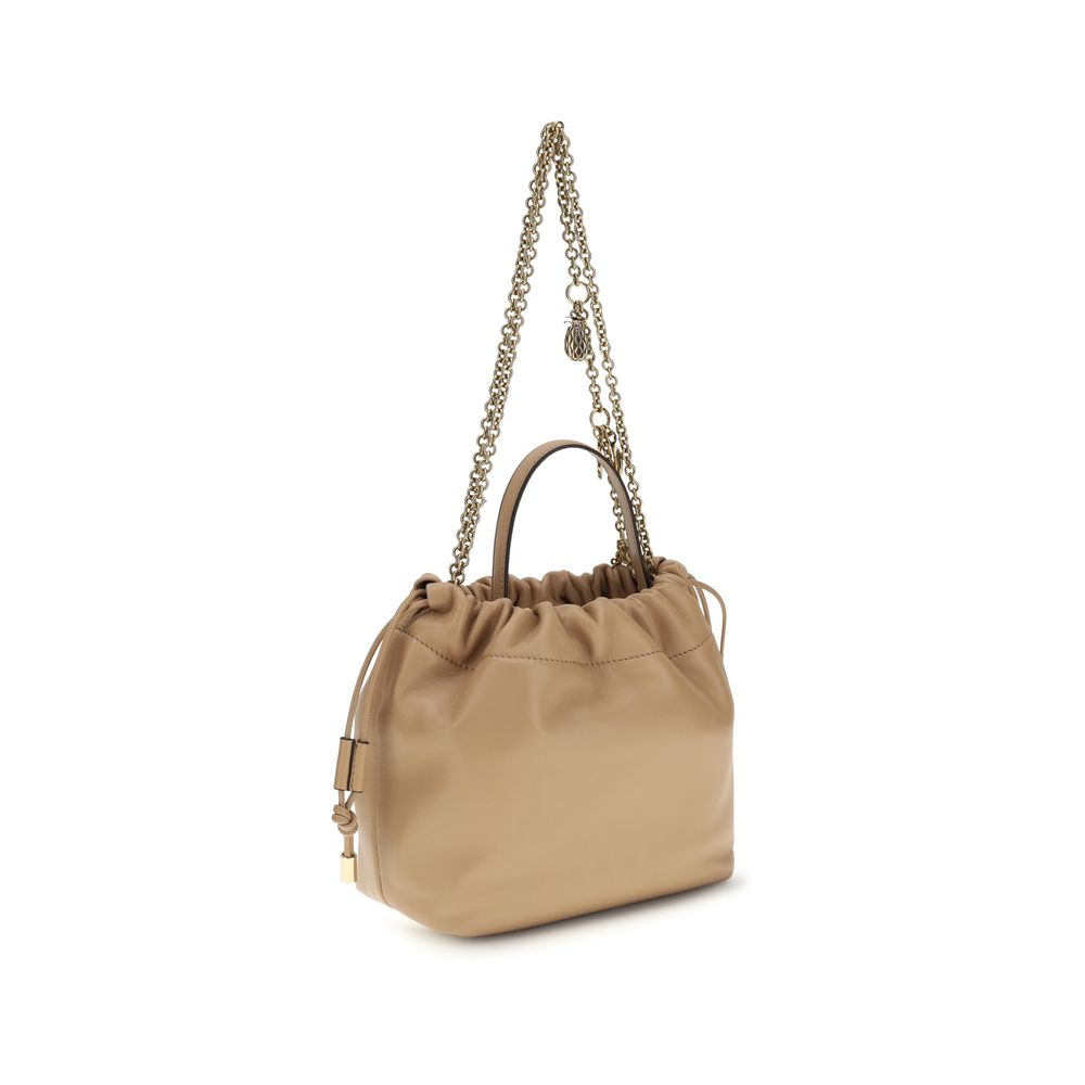 Shoulder Drawstring Bag by Chloé for women in lambskin leather beige showcases a enviable silhouette, artfully detailed with a secure drawstring, organized , and versatile shoulder-strap & handle for a enviable look.