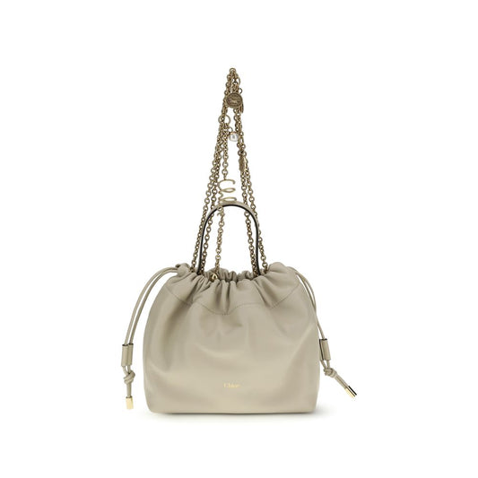 Shoulder Drawstring Bag by Chloé for women in nappa lambskin leather beige features a effortless sophistication silhouette, secured by a drawstring with ample and versatile shoulder-strap & handle for a effortless sophistication finish.