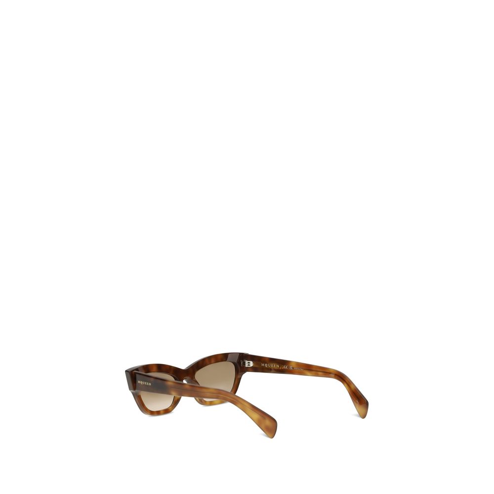 Sunglasses by Alexander McQueen for women in wool polyamide tweed and brown & gold featuring an stylish cat-eye frame design with a sophisticated brown coloured frame finish and high-performance .