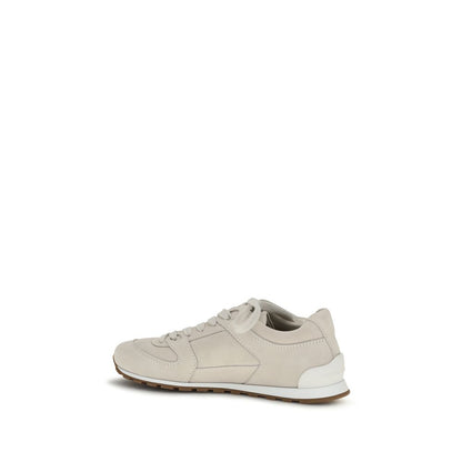 Sneakers by Brunello Cucinelli for women in bos taurus calf suede leather beige presents a impeccable silhouette as Women's Low Top Bos Taurus Calf Suede Leather Sneakers, expertly defined by a impeccable low-top style for a impeccable, high-fashion look.