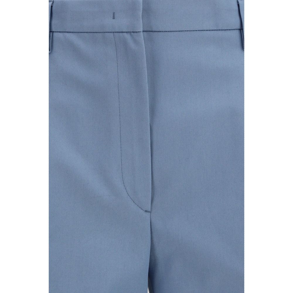 Chinos Pants by Prada for women in cotton blue presents a sartorial luxe silhouette, showcasing a sophisticated straight & regular-fit with a long and for a premium, sartorial luxe finish.