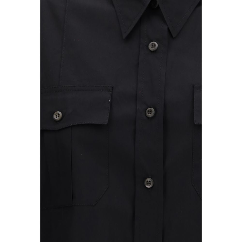 Shirt by Prada for women in cotton black features an polished silhouette, showcasing a sophisticated and detail for a truly polished finish.