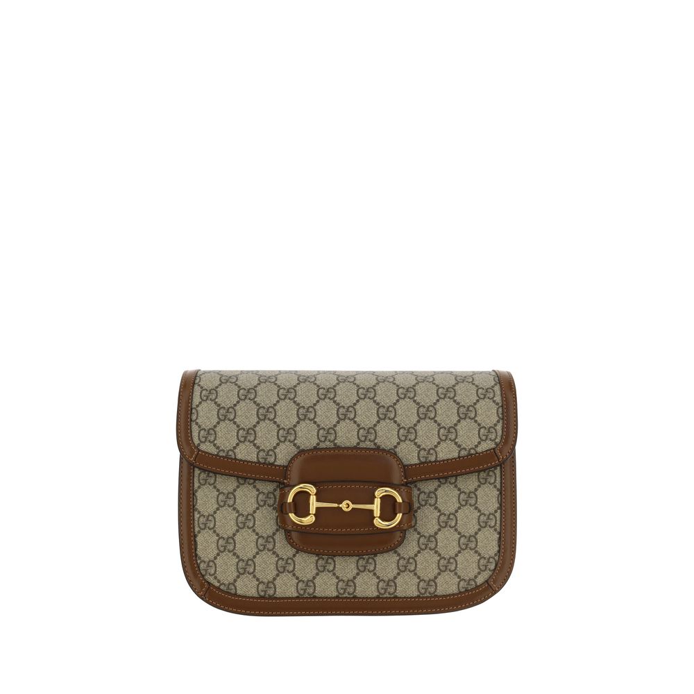 Shoulder Flap Handbag by Gucci for women in polyester polyurethane leather & cotton beige, gold, jacquard & print features a contemporary silhouette, showcasing a secure flap, ample , and contemporary shoulder-strap & adjustable-strap for a sophisticated look.