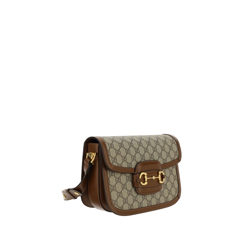 Shoulder Flap Handbag by Gucci for women in polyester polyurethane leather & cotton beige, gold, jacquard & print presents a ornamental silhouette, showcasing a secure flap, ample , and versatile shoulder-strap & adjustable-strap for a ornamental finish.