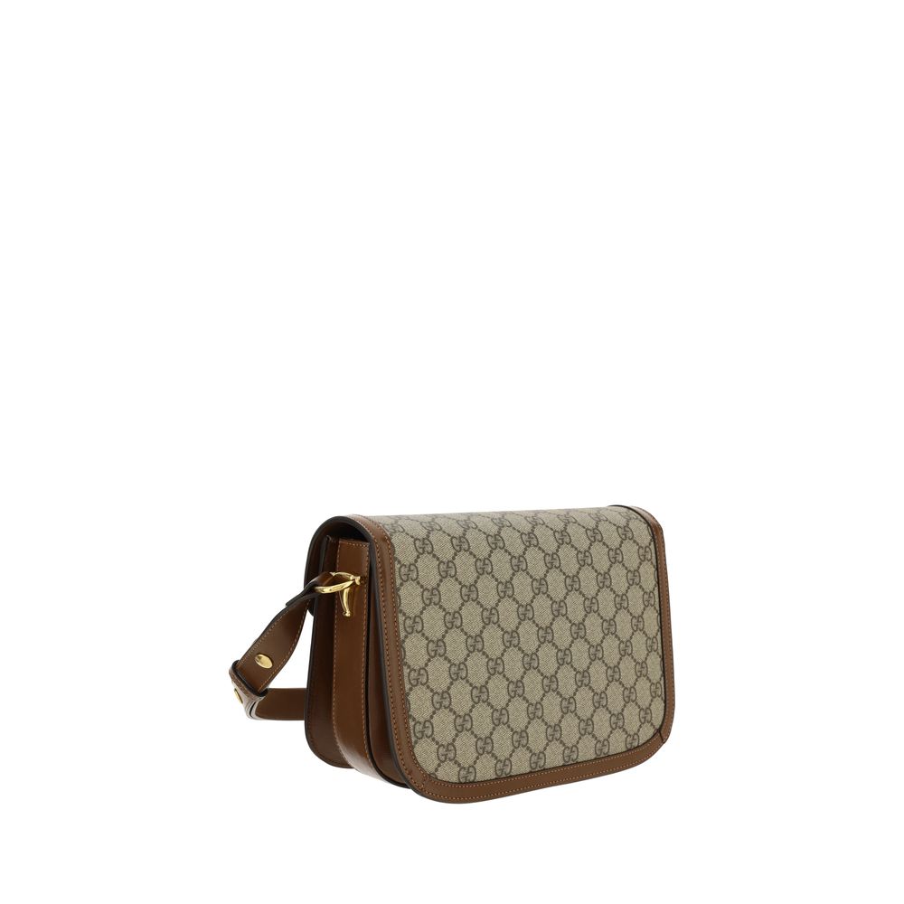 Shoulder Flap Handbag by Gucci for women in polyester polyurethane leather & cotton beige, gold, jacquard & print features a signature silhouette, showcasing a secure flap and signature with versatile shoulder-strap & adjustable-strap for a sophisticated look.