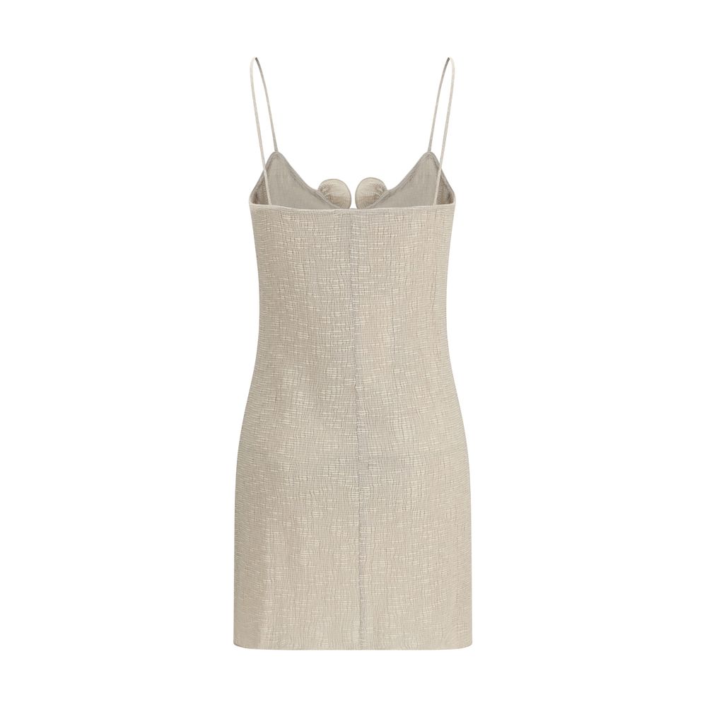 Dress by Magda Butrym for women in polyester cotton & lyocell beige & floral features a dramatic silhouette, showcasing an elegant and that flows into a dramatic short mini.
