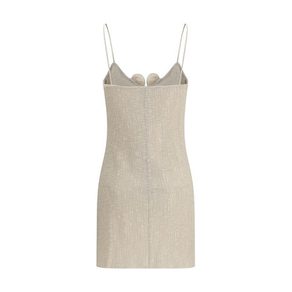 Dress by Magda Butrym for women in polyester cotton & lyocell beige & floral features a dramatic silhouette, showcasing an elegant and that flows into a dramatic short mini.