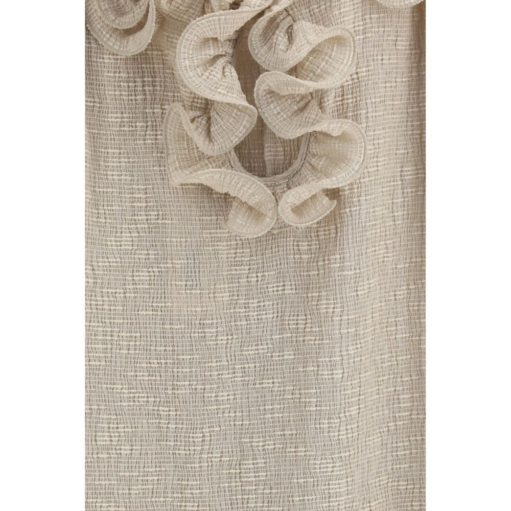 Dress by Magda Butrym for women in polyester cotton & lyocell beige & floral features an eye catching silhouette with a sophisticated , elegant , and a refined short mini for a eye catching aesthetic.