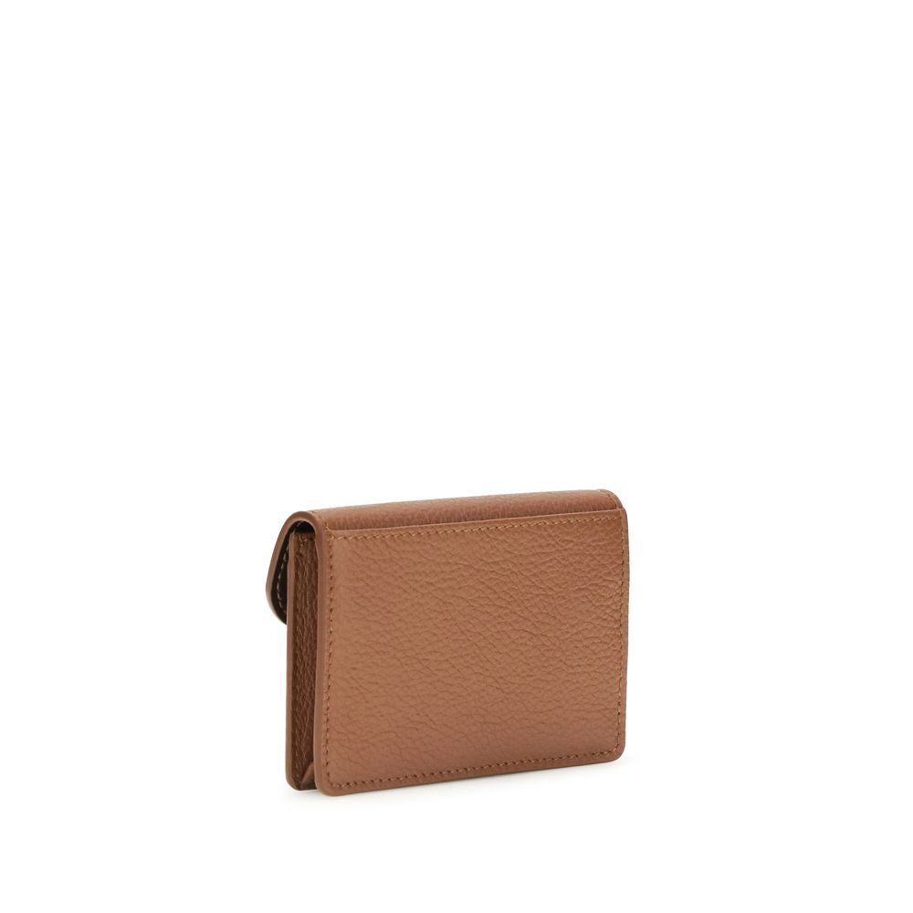 Cardholder Wallet by Ferragamo for women in bos taurus calfskin leather brown showcases a distinguished silhouette, artfully capturing the essence of the distinguished Gancini Bos Taurus Calfskin Leather Cardholder Wallet design with functional card-organization.