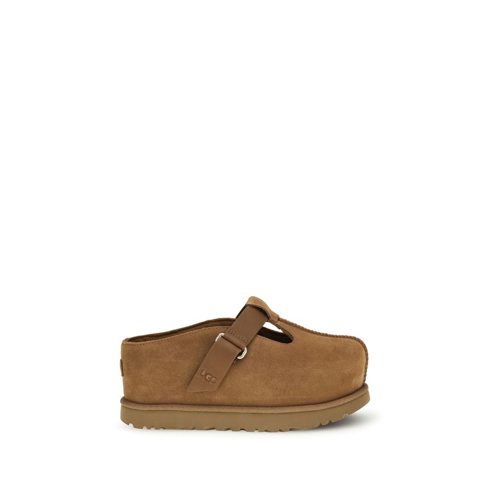 Mules Flat Shoes by UGG for women in eva & bos taurus suede calf leather brown features an statuesque silhouette from the Women's EVA & Bos Taurus Suede Calf Leather Mules Flat Shoes collection, showcasing a and a statuesque for a statuesque look.