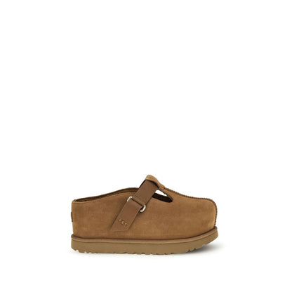 Mules Flat Shoes by UGG for women in eva & bos taurus suede calf leather brown features an statuesque silhouette from the Women's EVA & Bos Taurus Suede Calf Leather Mules Flat Shoes collection, showcasing a and a statuesque for a statuesque look.