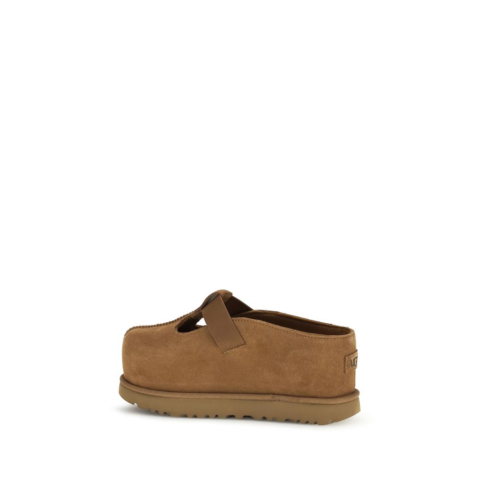 Mules Flat Shoes by UGG for women in eva & bos taurus suede calf leather brown presents a impeccable silhouette as Women's EVA & Bos Taurus Suede Calf Leather Mules Flat Shoes, artfully designed with a and a impeccable for a refined, upscale finish.