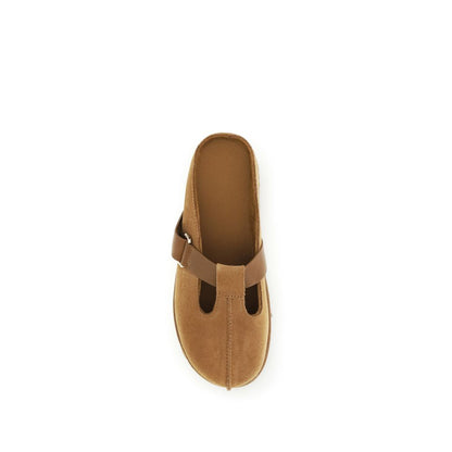 Mules Flat Shoes by UGG for women in eva & bos taurus suede calf leather brown showcases a enchanting silhouette as part of the Women's EVA & Bos Taurus Suede Calf Leather Mules Flat Shoes collection, defined by a enchanting and for a enchanting look.