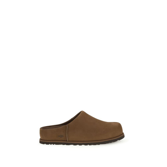 Flat Mule Mules Slip-On Shoes by UGG for men in eva & bos taurus nubuck calf leather brown showcases a resplendent Men's EVA & Bos Taurus Nubuck Calf Leather Flat Mule Mules Slip-On Shoes aesthetic, defined by its resplendent and elegant flat.