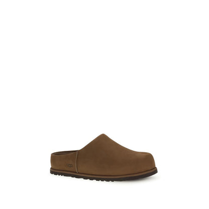 Flat Mule Mules Slip-On Shoes by UGG for men in eva & bos taurus nubuck calf leather brown showcases a timeless silhouette from the Men's EVA & Bos Taurus Nubuck Calf Leather Flat Mule Mules Slip-On Shoes collection, featuring a timeless flat and for a timeless finish.