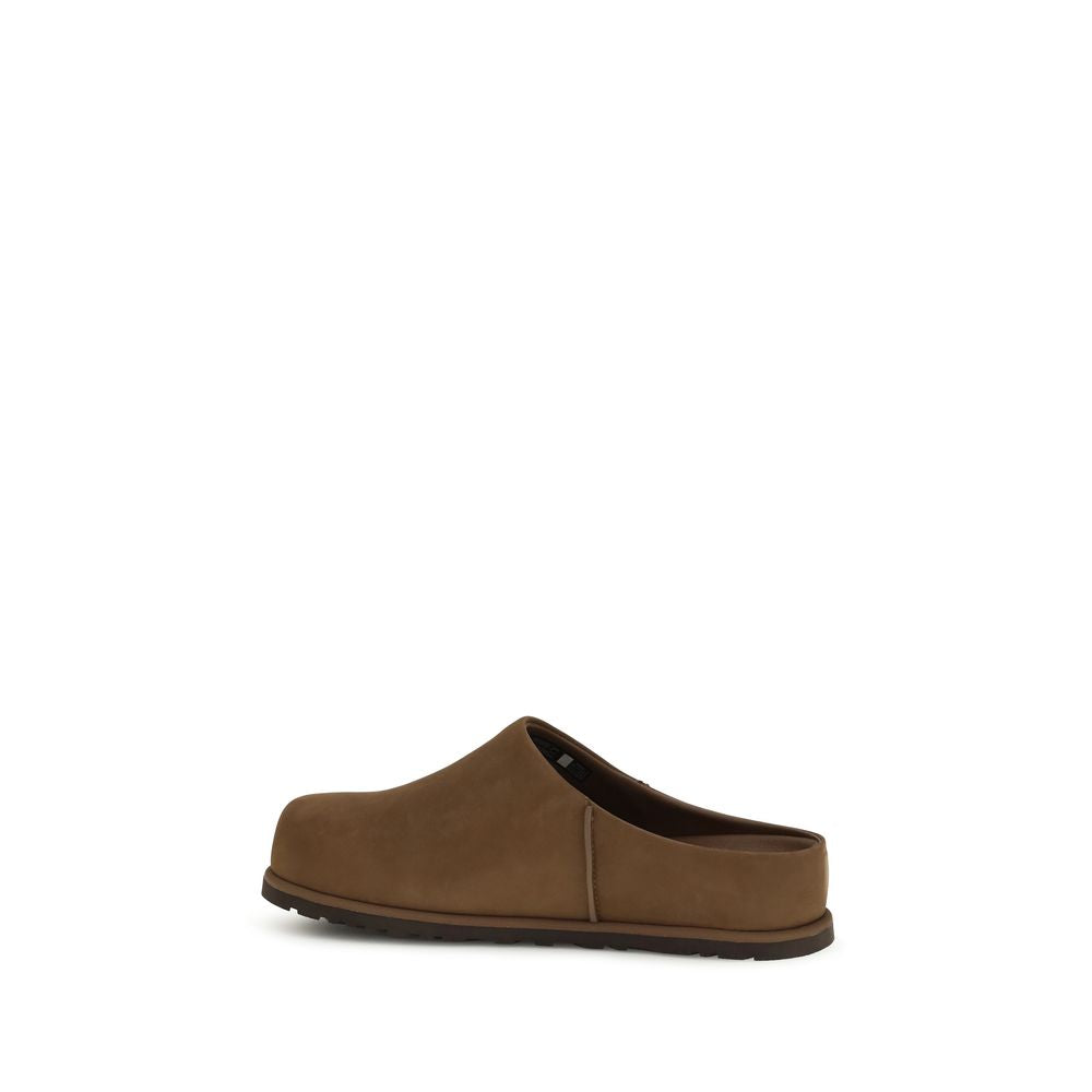 Flat Mule Mules Slip-On Shoes by UGG for men in eva & bos taurus nubuck calf leather brown features an dynamic silhouette from the Men's EVA & Bos Taurus Nubuck Calf Leather Flat Mule Mules Slip-On Shoes collection, defined by a dynamic and flat for a dynamic look.