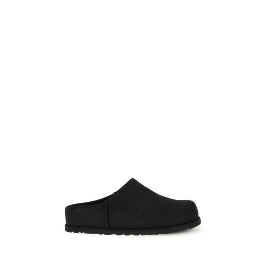 Flat Mule Mules Slip-On Shoes by UGG for men in eva & bos taurus nubuck calf leather black showcases a timeless silhouette from the Men's EVA & Bos Taurus Nubuck Calf Leather Flat Mule Mules Slip-On Shoes collection, featuring a timeless flat and for a timeless finish.