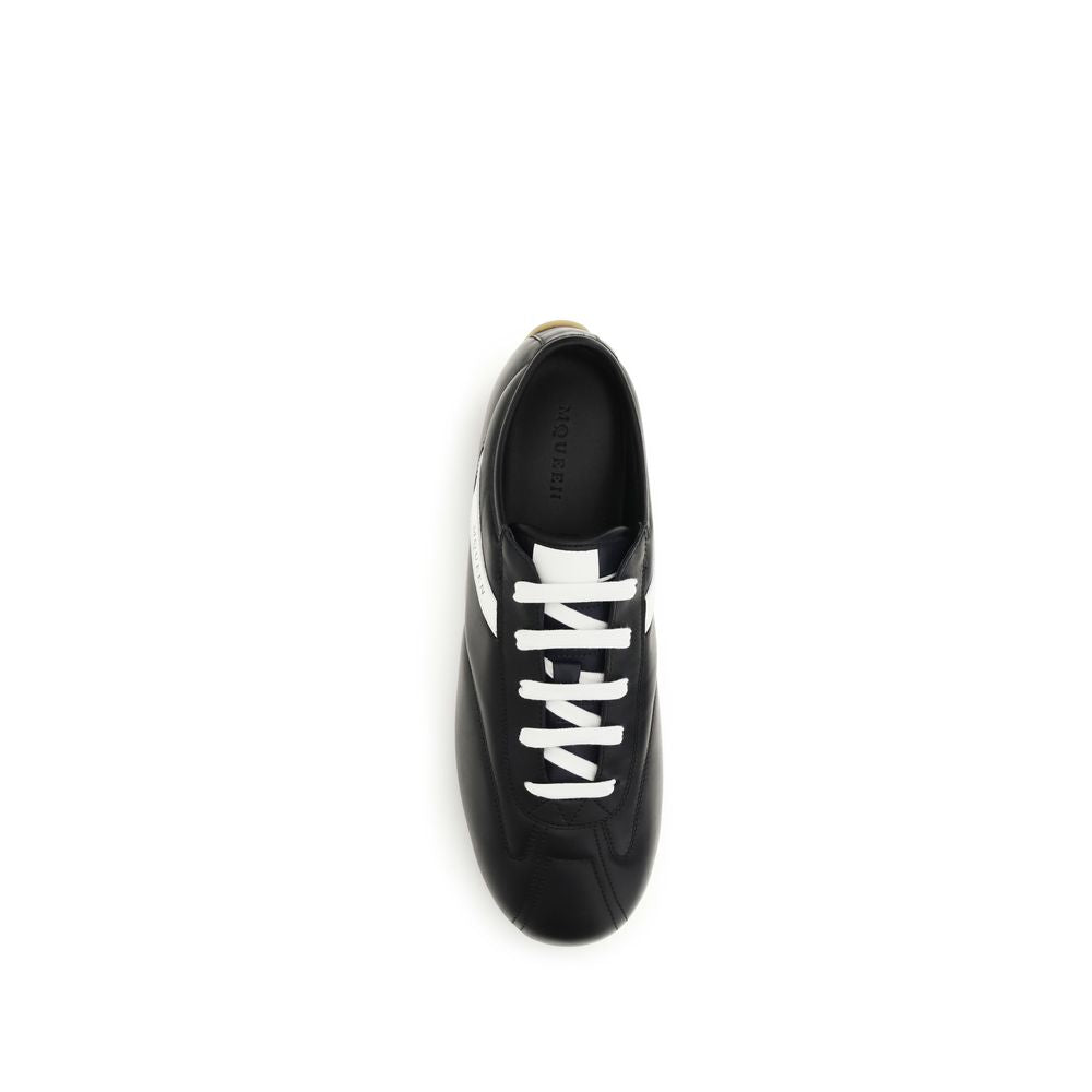 Sneakers by Alexander McQueen for men in bos taurus calf nappa leather black presents a sumptuous silhouette, artfully capturing the essence of the Men's Low Top Bos Taurus Calf Nappa Leather Sneakers with its sumptuous low-top style design.