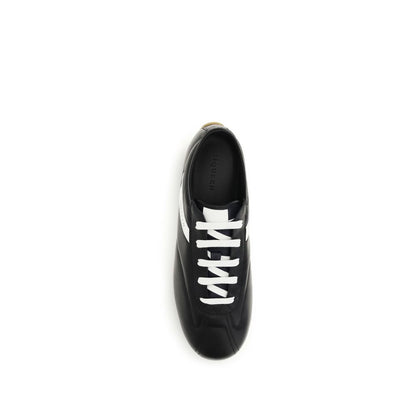 Sneakers by Alexander McQueen for men in bos taurus calf nappa leather black presents a sumptuous silhouette, artfully capturing the essence of the Men's Low Top Bos Taurus Calf Nappa Leather Sneakers with its sumptuous low-top style design.