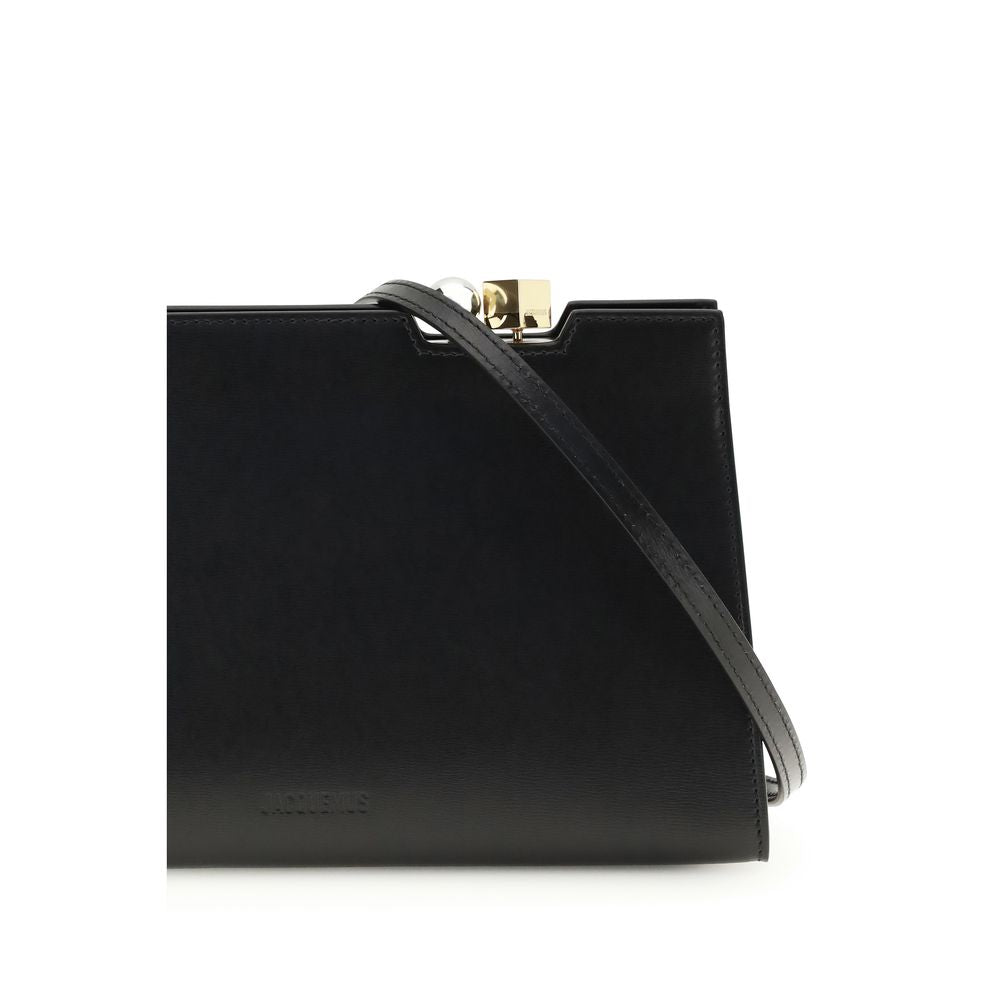 Shoulder Bag by Jacquemus for women in bos taurus calf leather black, gold & silver showcases a enviable silhouette, artfully detailed with a secure magnetic, organized , and versatile shoulder-strap & handle for a enviable look.