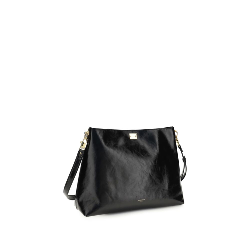 Large Shoulder Bag by Dolce & Gabbana for women in bos taurus calfskin leather & bio- acetate black features an effortlessly chic silhouette with a secure , ample , and versatile shoulder-strap & adjustable-strap for effortlessly chic everyday luxury.