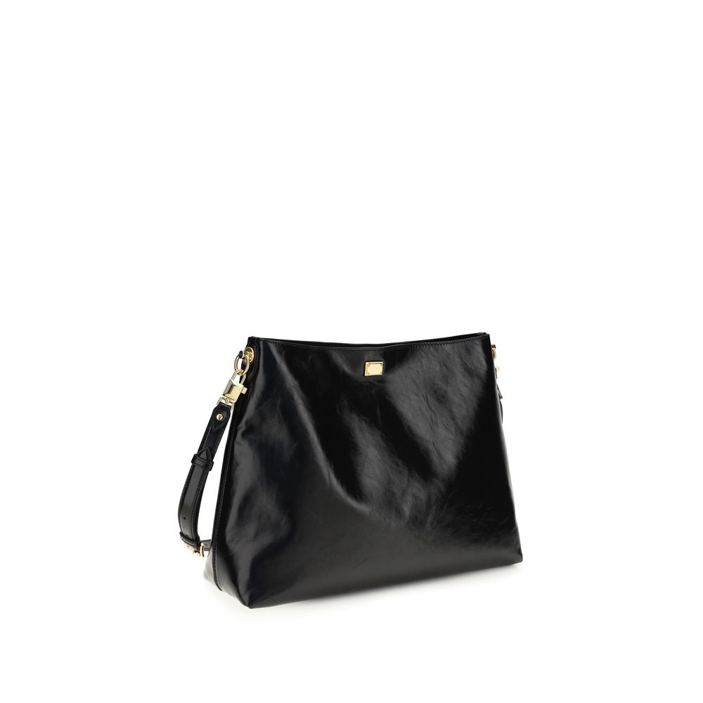 Large Shoulder Bag by Dolce & Gabbana for women in bos taurus calfskin leather & bio- acetate black features a distinguished silhouette, showcasing a secure and distinguished with versatile shoulder-strap & adjustable-strap for a distinguished finish.