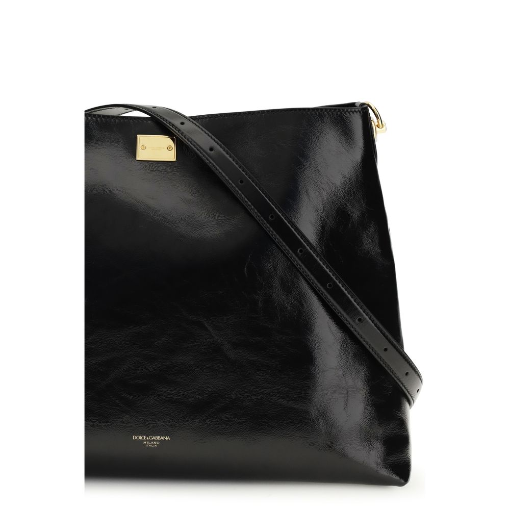 Large Shoulder Bag by Dolce & Gabbana for women in bos taurus calfskin leather & bio- acetate black showcases a enviable silhouette, artfully detailed with a secure , organized , and versatile shoulder-strap & adjustable-strap for a enviable look.