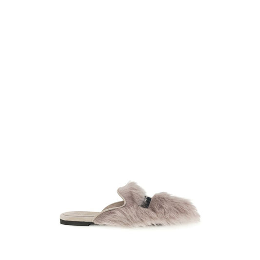 Mules Flat Shoes by Dolce & Gabbana for women in goatskin leather gray showcases a dynamic silhouette, artfully capturing Women's Goatskin Leather Mules Flat Shoes through its distinctive and elegant .