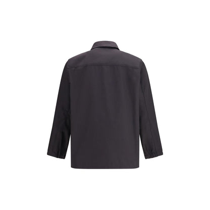 Overcoat by GR10K for men in cotton polyester gray features a cosy chic silhouette, artfully detailed with a sophisticated and premium pockets for a cosy chic finish.