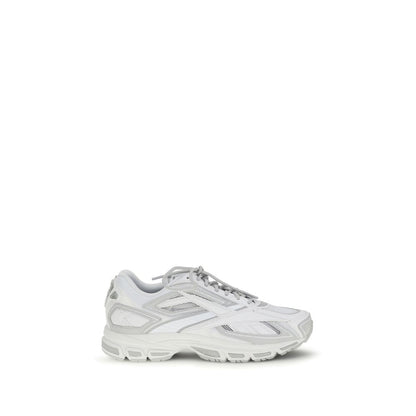Athletic Sneakers by Reebok for men in polyester polyethylene & polyurethane white showcases a architectural silhouette, artfully capturing the essence of the Men's Athletic Polyester Polyethylene & Polyurethane Sneakers with its signature architectural athletic style construction.