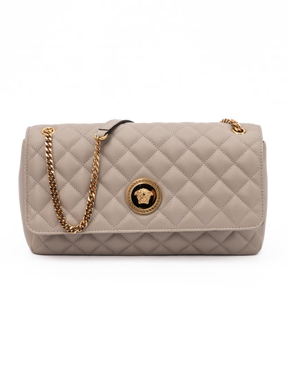 Medium Quilted Shoulder Bag by Versace for women in lamb leather beige features a effortless sophistication silhouette, secured by a with ample internal-pockets and versatile shoulder-strap & handle for a effortless sophistication finish.