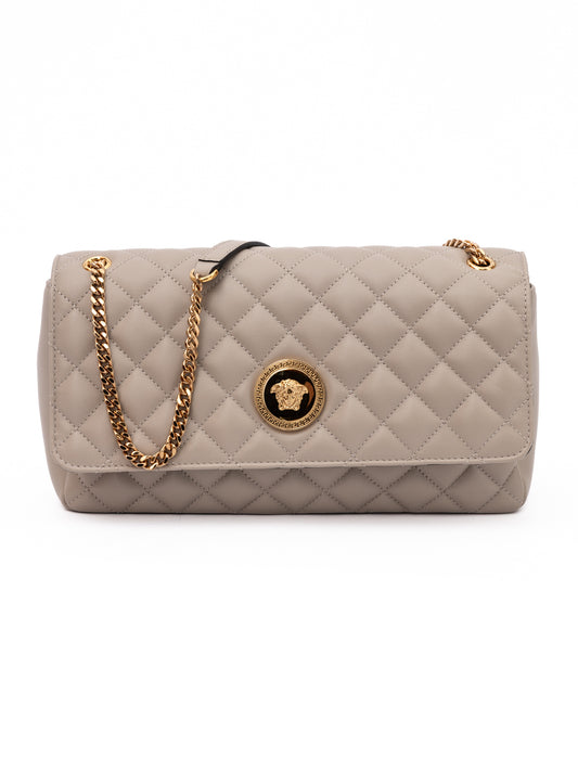 Medium Quilted Shoulder Bag by Versace for women in lamb leather beige features a effortless sophistication silhouette, secured by a with ample internal-pockets and versatile shoulder-strap & handle for a effortless sophistication finish.