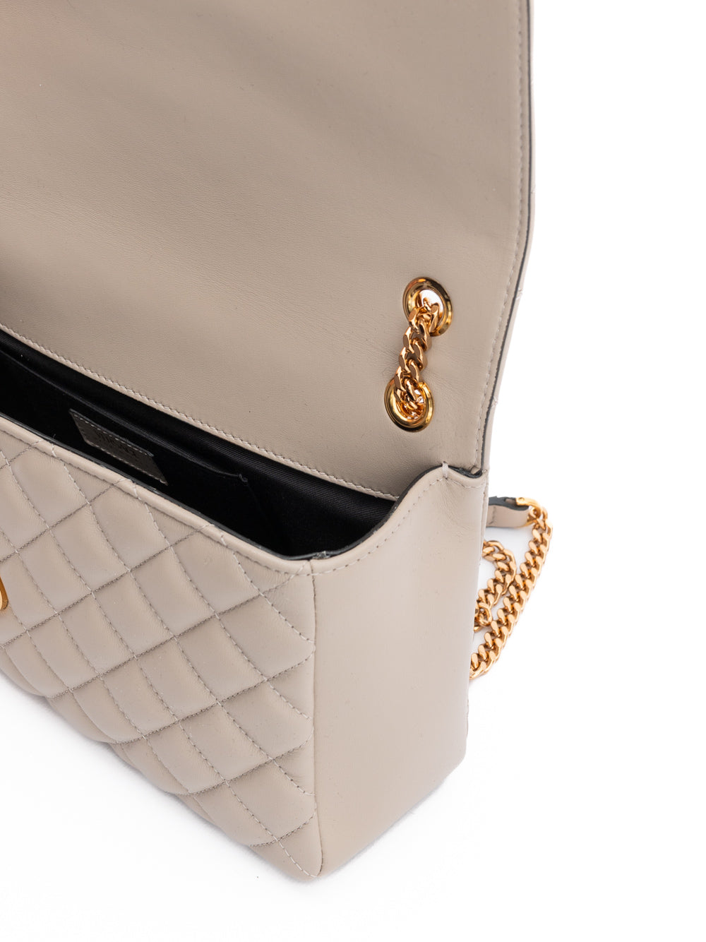 Medium Quilted Shoulder Bag by Versace for women in lamb leather beige showcases a statuesque silhouette, artfully detailed with a secure , organized internal-pockets, and versatile shoulder-strap & handle for a statuesque look.