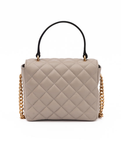 Medium Quilted Shoulder Bag by Versace for women in lamb leather beige features a effortless chic silhouette with a secure , ample internal-pockets, and versatile shoulder-strap & handle for a effortless chic finish.