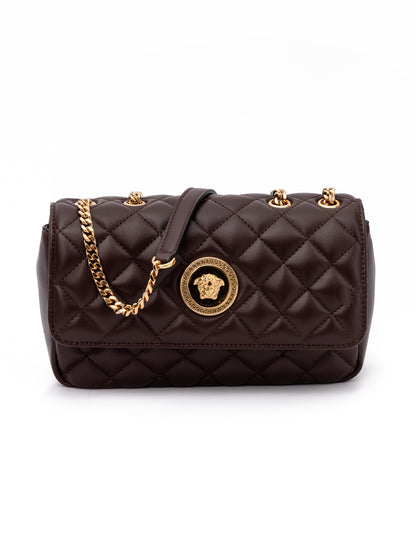 Medium Quilted Shoulder Bag by Versace for women in lamb leather beige & brown features an effortlessly chic silhouette with a secure , ample internal-pockets, and versatile shoulder-strap & handle for effortlessly chic everyday luxury.