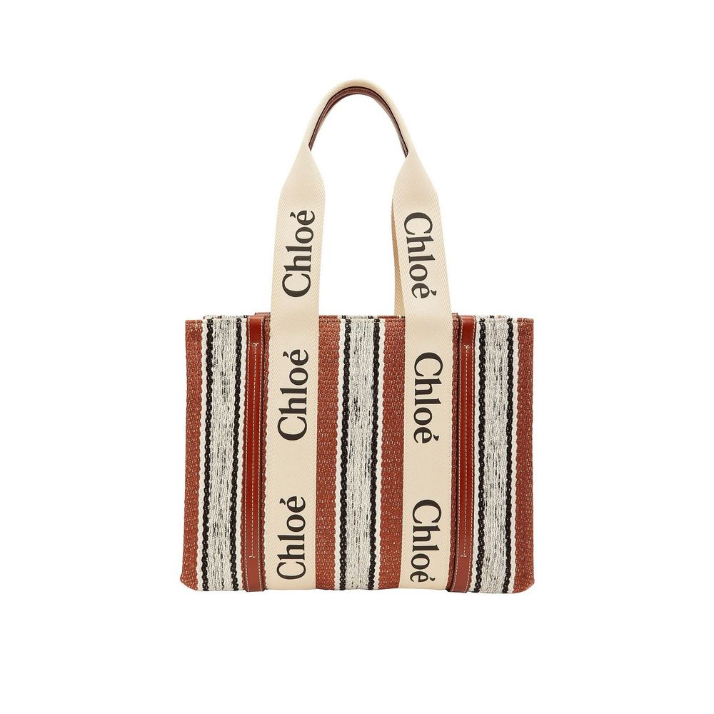 Large Tote Bag by Chloé for women in cotton polyester canvas brown & signature showcases a statuesque Cotton Polyester Canvas Large Tote Bag design, featuring a secure , ample , and versatile handle for a statuesque finish.