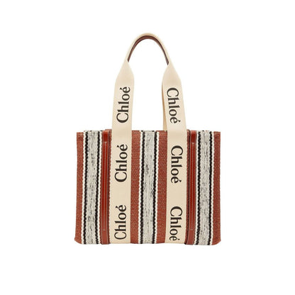 Large Tote Bag by Chloé for women in cotton polyester canvas brown & signature showcases a statuesque Cotton Polyester Canvas Large Tote Bag design, featuring a secure , ample , and versatile handle for a statuesque finish.