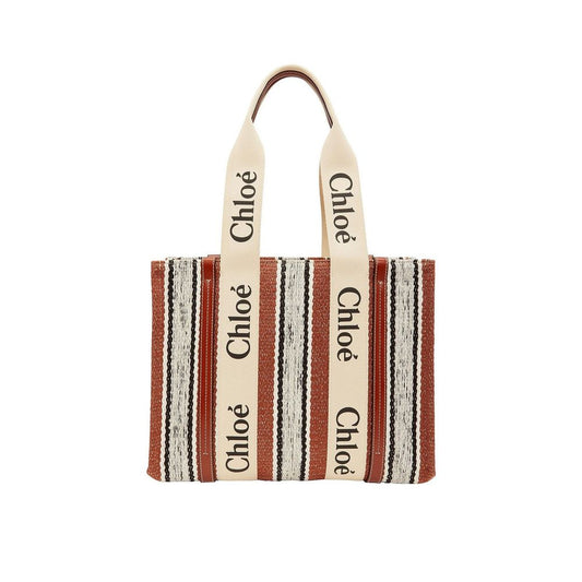 Large Tote Bag by Chloé for women in cotton polyester canvas brown & signature showcases a statuesque Cotton Polyester Canvas Large Tote Bag design, featuring a secure , ample , and versatile handle for a statuesque finish.